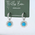 Tarnish Resistant Blue Sunburst Huggies: Silver