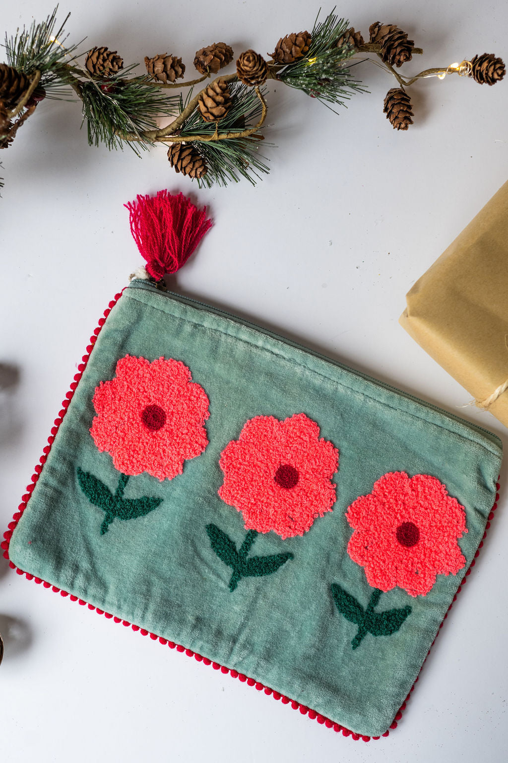 Velvet Triple Flower pattern pouch with stitched detail and tassel on zip