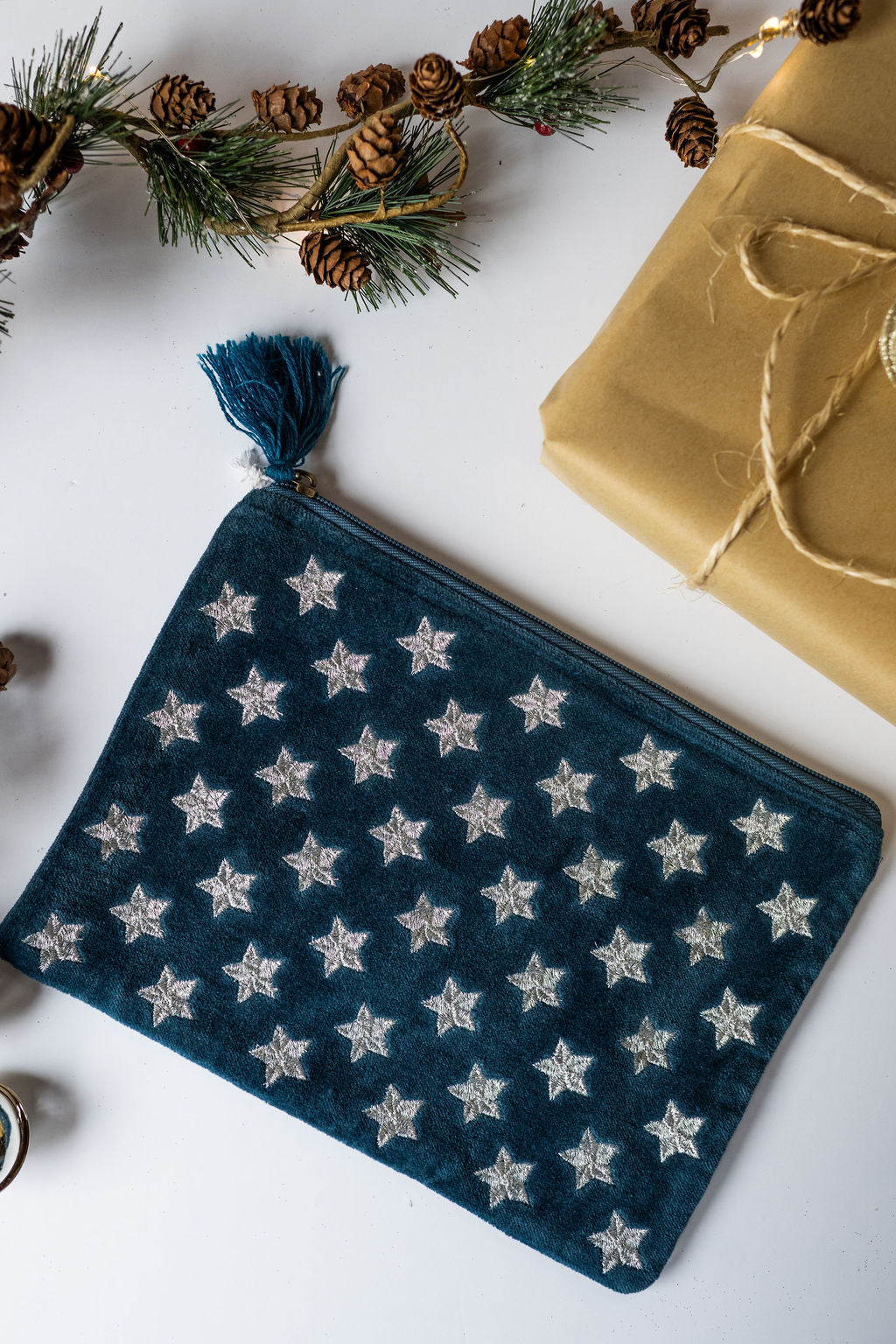 Velvet Star pattern pouch with stitched detail and tassel on zip