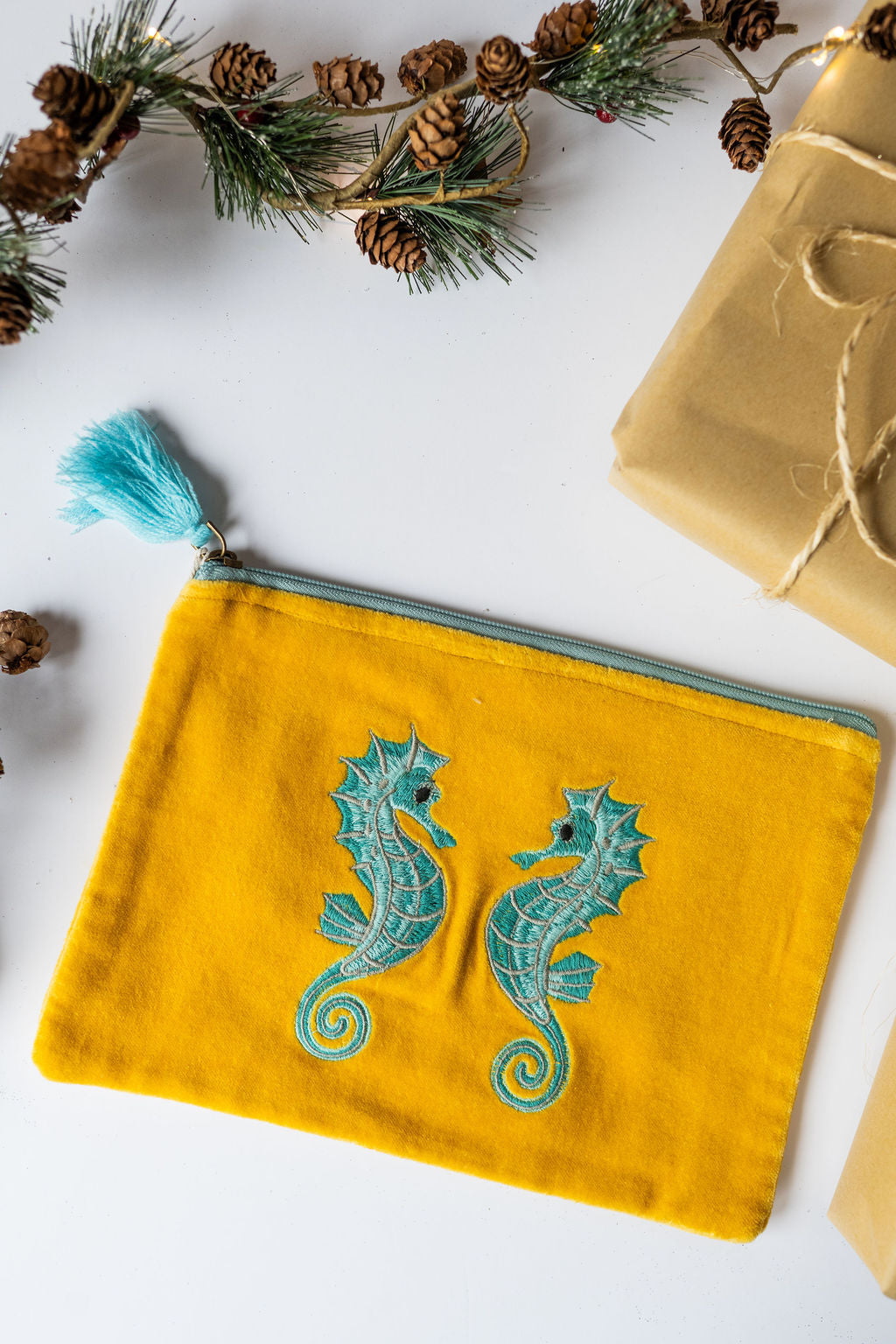 Velvet Seahorse pattern pouch with stitched detail and tassel on zip