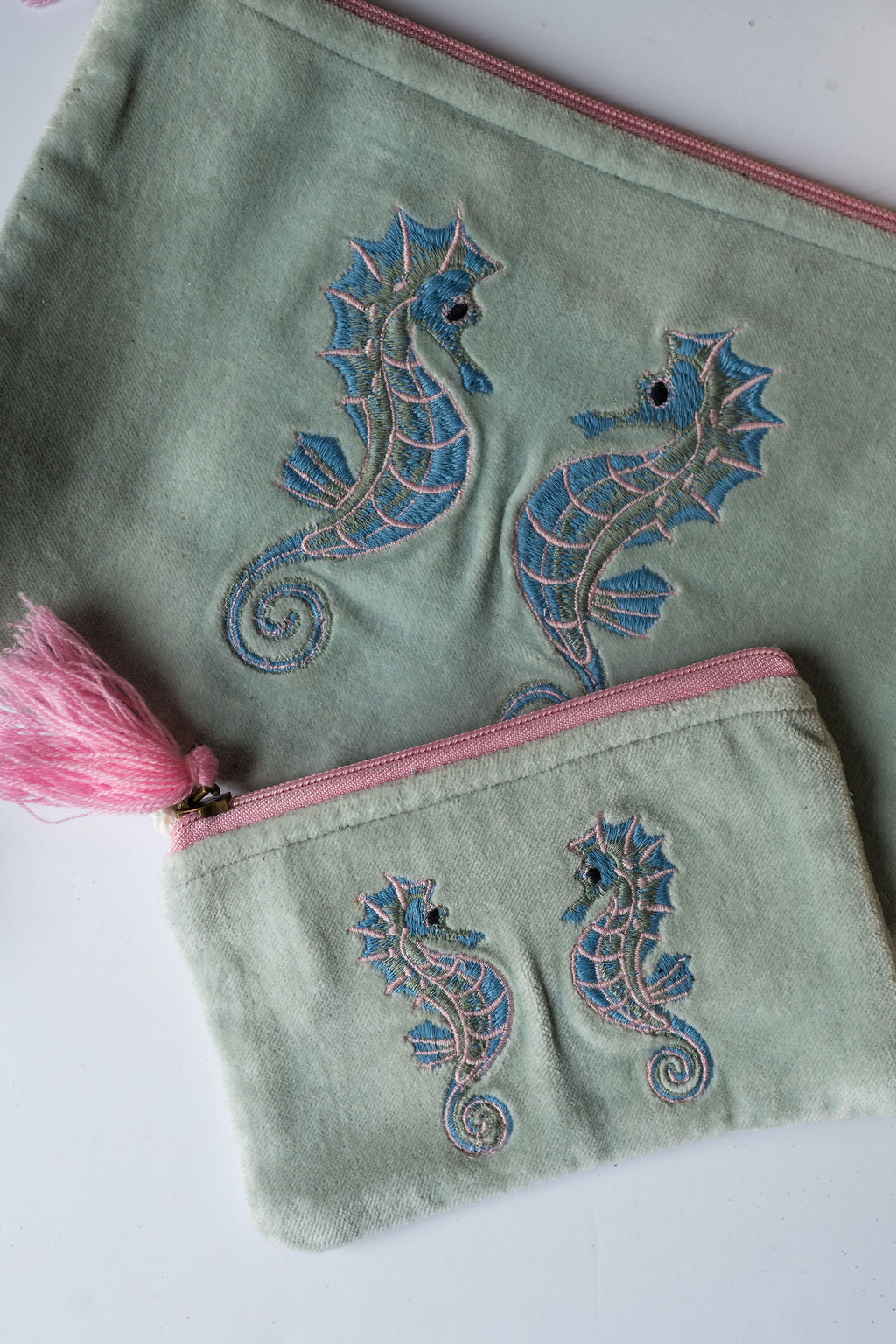Velvet Seahorse pattern pouch with stitched detail and tassel on zip