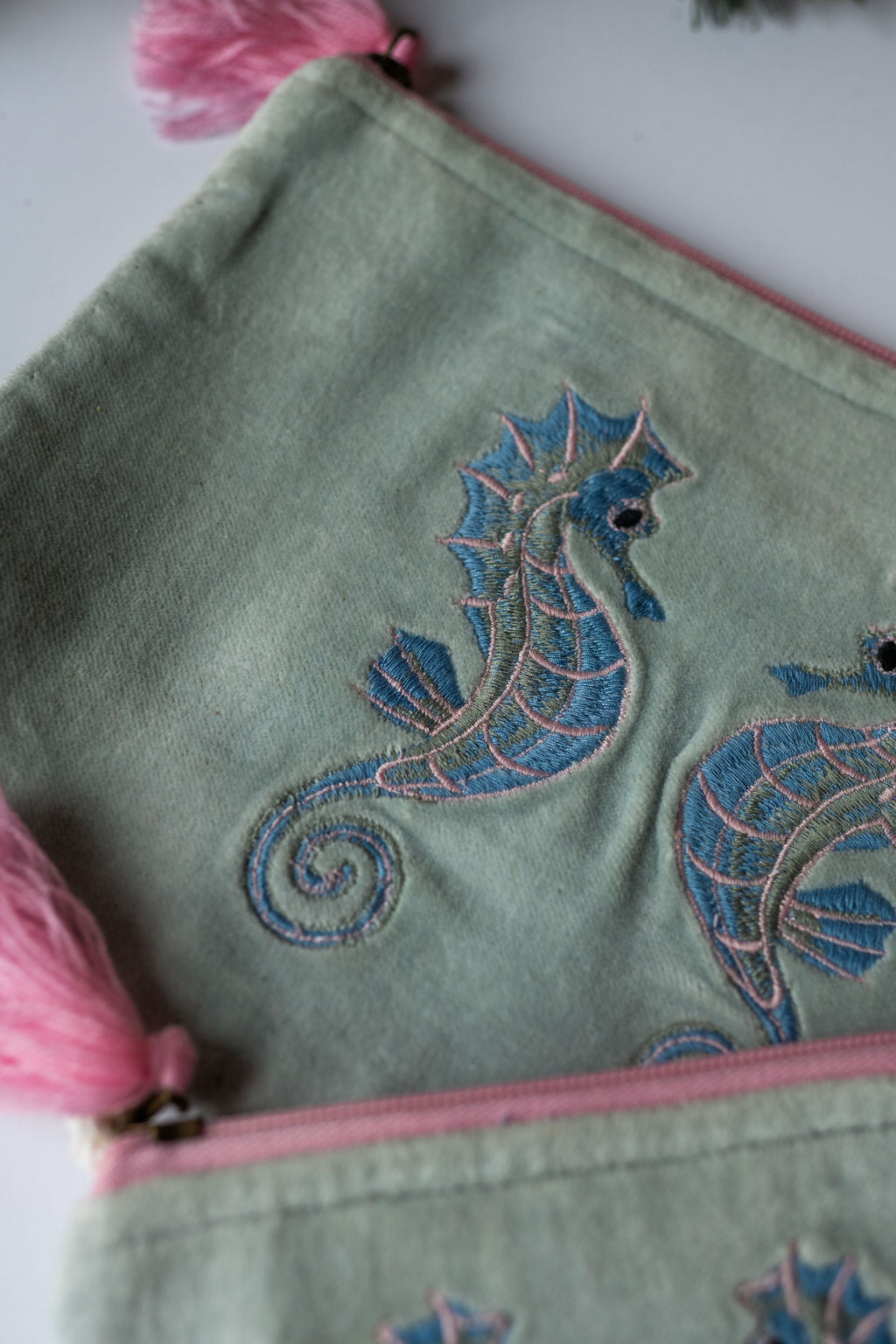 Velvet Seahorse pattern pouch with stitched detail and tassel on zip