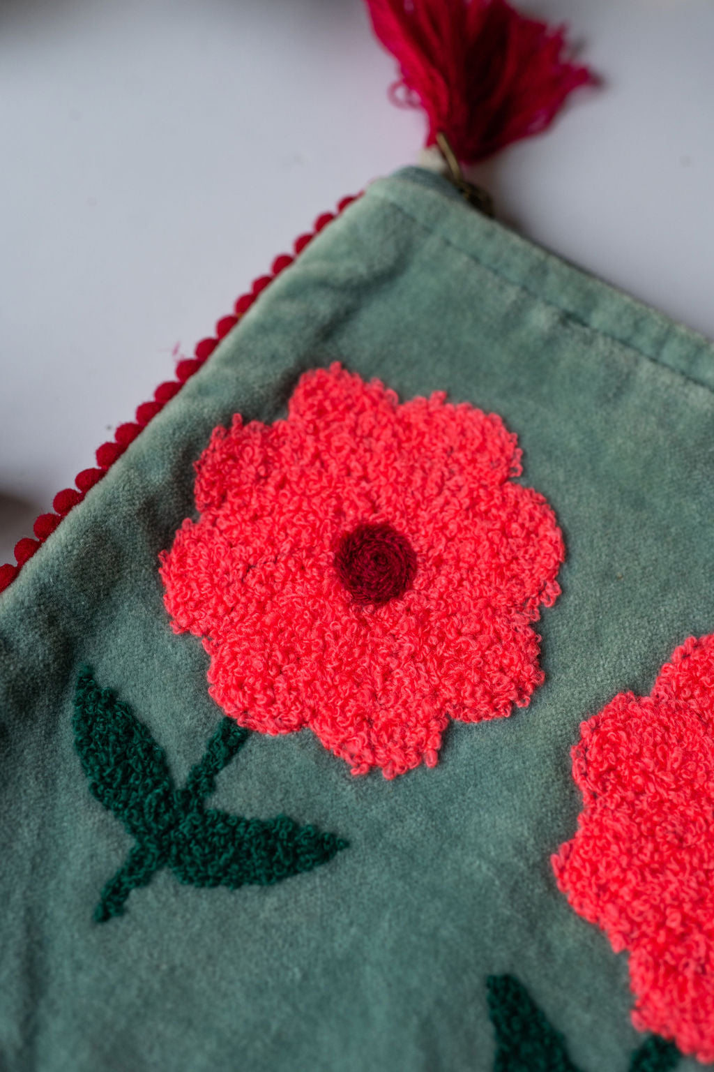 Velvet Triple Flower pattern pouch with stitched detail and tassel on zip