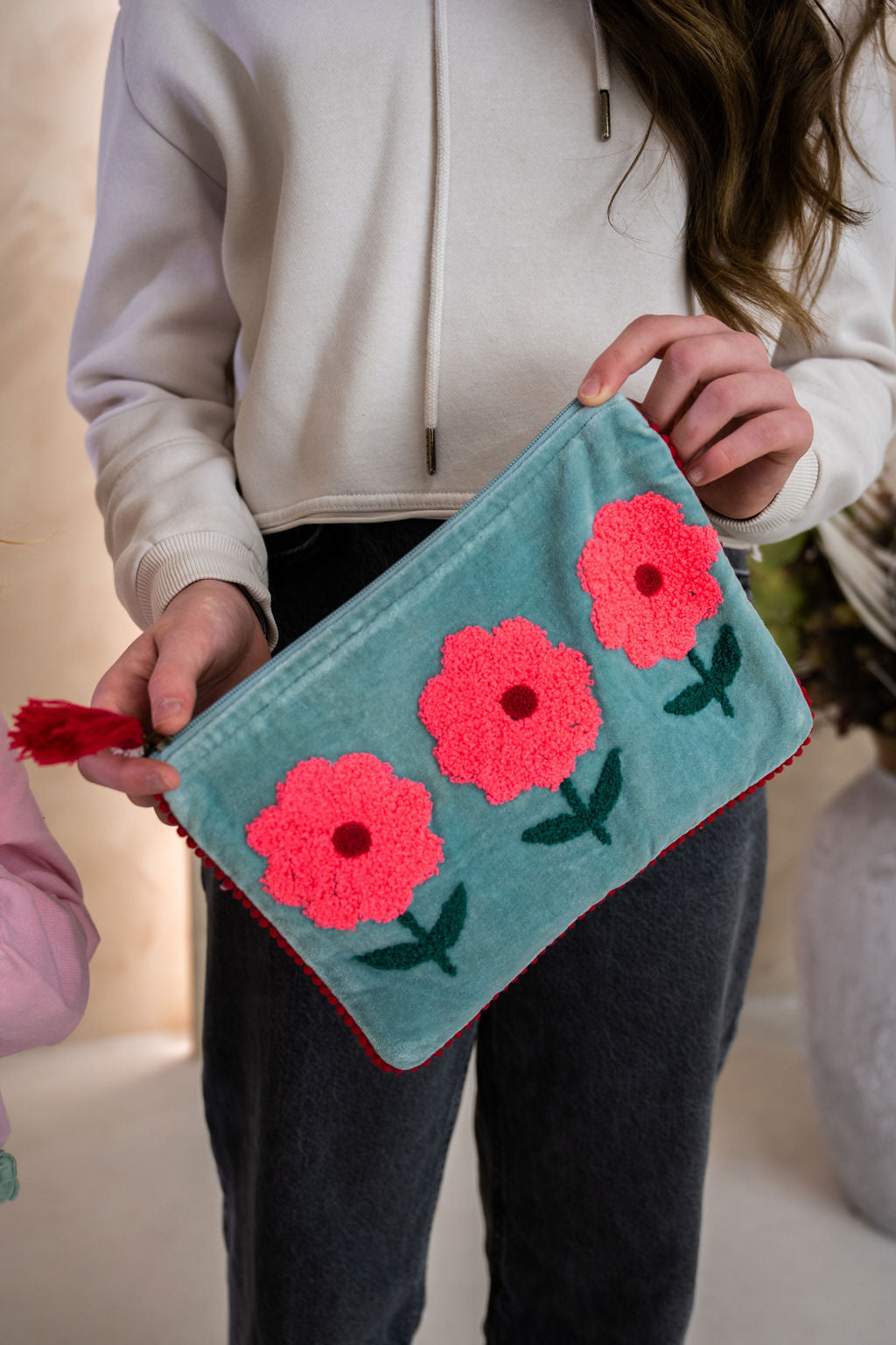Velvet Triple Flower pattern pouch with stitched detail and tassel on zip