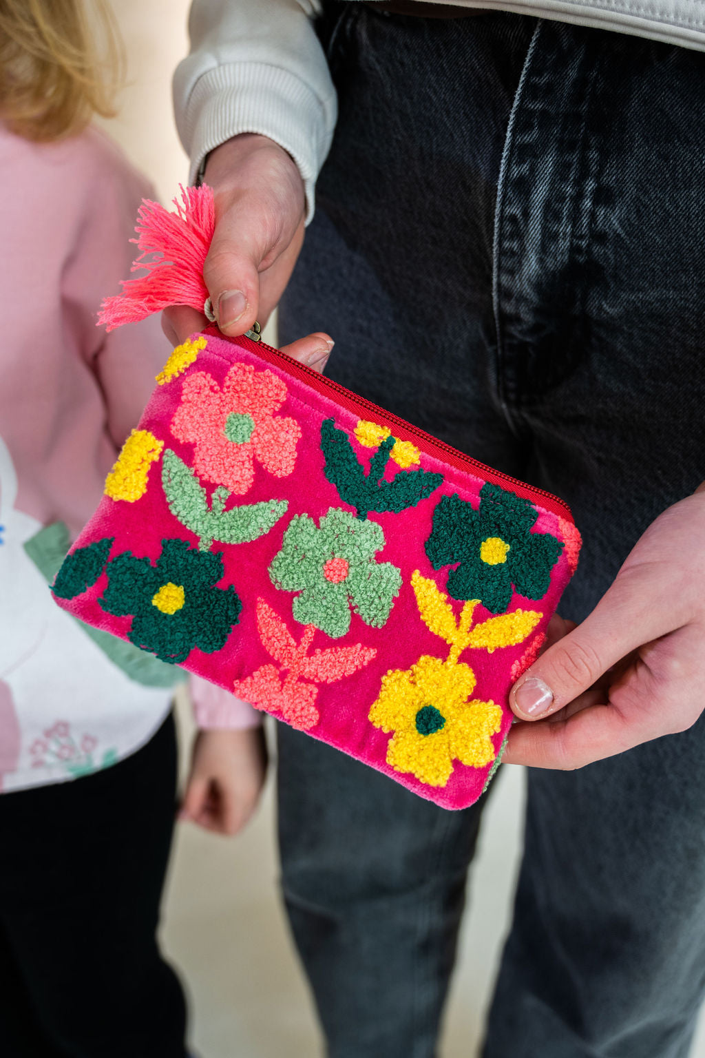 Velvet Multi Flower pattern pouch with stitched detail and tassel on zip